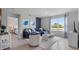 Cozy living room with comfortable seating, stylish decor, and a view to the bedroom at 3346 Wakefield Dr, Haines City, FL 33844