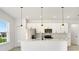Bright kitchen with an island, stainless steel appliances, and a window view at 3420 Sw 130Th Lane Rd, Ocala, FL 34473