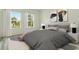 Serene bedroom with soft lighting, plush bedding, and elegant decor for a restful retreat at 3420 Sw 130Th Lane Rd, Ocala, FL 34473
