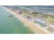 Expansive aerial view shows beachfront condos with convenient access to the pier and ocean at 3641 S Atlantic Ave # 110, Daytona Beach, FL 32118