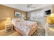 Comfortable bedroom with ample light and decor at 3641 S Atlantic Ave # 110, Daytona Beach, FL 32118