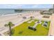 Outdoor social area featuring a fire pit, picnic tables and walkways to the beach at 3641 S Atlantic Ave # 110, Daytona Beach, FL 32118