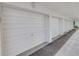 Ground level parking garage with assigned spaces for residents at 3641 S Atlantic Ave # 110, Daytona Beach, FL 32118