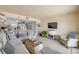 Living room with comfortable seating and access to kitchen at 3641 S Atlantic Ave # 110, Daytona Beach, FL 32118