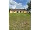 Expansive backyard with lush green grass, offering ample space for outdoor activities and relaxation at 3651 Sail Harbor Dr, Kissimmee, FL 34746