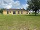 Spacious backyard showcasing a well-maintained lawn, perfect for gatherings and enjoying the outdoors at 3651 Sail Harbor Dr, Kissimmee, FL 34746