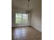 The dining room features tile flooring and natural light at 3651 Sail Harbor Dr, Kissimmee, FL 34746