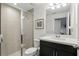 Updated bathroom with glass enclosed shower and modern vanity at 439 Windmill Palm Cir, Altamonte Springs, FL 32701