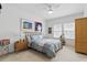 Bright bedroom featuring neutral walls, stylish furnishings, and comfortable sleeping space at 439 Windmill Palm Cir, Altamonte Springs, FL 32701