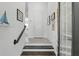 Bright entryway with stairs featuring modern decor and light wood floors at 439 Windmill Palm Cir, Altamonte Springs, FL 32701