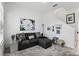 Cozy living room featuring a plush rug, stylish decor, and an open staircase at 439 Windmill Palm Cir, Altamonte Springs, FL 32701