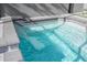 Inviting spa with cascading waterfall feature for ultimate relaxation at 4414 Le Reve Ct, Kissimmee, FL 34746