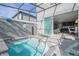 Sparkling pool with a waterfall feature and inviting lounge area at 4414 Le Reve Ct, Kissimmee, FL 34746