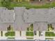 Aerial top-down view of the property highlighting the roof, landscaping, parking, and neighborhood at 479 Harbor Winds Ct, Winter Springs, FL 32708