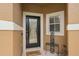 Charming front entryway with a decorative glass door and welcome mat at 479 Harbor Winds Ct, Winter Springs, FL 32708