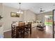 Open-concept design with hardwood flooring, dining area, and comfortable seating is perfect for entertaining guests at 479 Harbor Winds Ct, Winter Springs, FL 32708