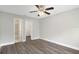 Comfortable primary bedroom featuring modern ceiling fan and easy access to bathroom and closet at 4870 S Semoran Blvd # 1905, Orlando, FL 32822