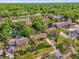 Aerial view of a house with lot lines displayed, showing its boundaries within a neighborhood at 512 Dixson St, Orange City, FL 32763