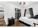 Bedroom with a window, closet, black dresser, and overhead fan at 512 Dixson St, Orange City, FL 32763