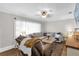 Relaxing living room area with a plush sectional sofa and warm, inviting ambiance at 512 Dixson St, Orange City, FL 32763