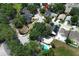 Charming neighborhood aerial view with mature trees and well-maintained homes at 5165 Mystic Point Ct, Orlando, FL 32812