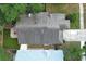 A bird's eye view of houses revealing roof types and backyard layouts at 5165 Mystic Point Ct, Orlando, FL 32812