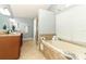 The bathroom includes a soaking tub and dual sink vanity at 5165 Mystic Point Ct, Orlando, FL 32812