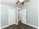 Bedroom boasts new flooring, overhead lighting and access to the closets at 5165 Mystic Point Ct, Orlando, FL 32812
