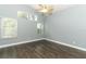 Light-filled bedroom with multiple windows and a ceiling fan at 5165 Mystic Point Ct, Orlando, FL 32812