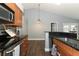 Bright kitchen featuring stainless steel appliances, granite countertops and breakfast bar at 5165 Mystic Point Ct, Orlando, FL 32812