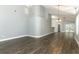 The spacious living room includes updated flooring, fresh neutral paint, and an open design at 5165 Mystic Point Ct, Orlando, FL 32812