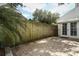 Enclosed patio area with brick pavers and privacy fence at 5165 Mystic Point Ct, Orlando, FL 32812