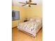 Bedroom featuring a ceiling fan and a bed with a decorative bedspread at 596 Starstone Dr, Lake Mary, FL 32746