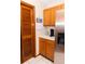 The kitchen features wood cabinets and stainless steel refrigerator with a water and ice dispenser at 596 Starstone Dr, Lake Mary, FL 32746