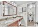 Elegant bathroom showcasing a granite vanity and vanity, providing a luxurious experience at 6337 Parc Corniche Dr # 2312, Orlando, FL 32821