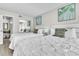 Bright bedroom equipped with twin beds and ample closet space for convenient living at 6337 Parc Corniche Dr # 2312, Orlando, FL 32821