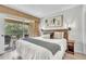 Relaxing main bedroom with balcony access offering serene views, providing a private retreat at 6337 Parc Corniche Dr # 2312, Orlando, FL 32821