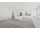 Open-concept living area showcasing a kitchen with island, ample space, and a contemporary feel at 6723 Sherpa Trl, St Cloud, FL 34771