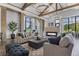 Community center lounge with sofas, fireplace and plenty of natural light at 7053 Painted Bunting Way, St Cloud, FL 34773