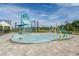 Playful splash pad featuring colorful water features for hours of fun at 7053 Painted Bunting Way, St Cloud, FL 34773