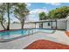 Inviting pool area features ample space and stylish design, perfect for relaxation and entertainment at 7124 Turquoise Ln, Orlando, FL 32807
