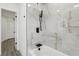 Bathroom featuring modern tiling and fixtures in the shower and bath area at 7124 Turquoise Ln, Orlando, FL 32807