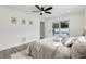 Bright bedroom with a sliding glass door leading to the outdoor pool area at 7124 Turquoise Ln, Orlando, FL 32807