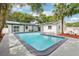 A beautiful pool in a backyard, with a concrete deck and a well-maintained yard at 7124 Turquoise Ln, Orlando, FL 32807