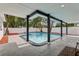 Inviting pool area featuring a sparkling pool and covered patio, perfect for relaxation at 7124 Turquoise Ln, Orlando, FL 32807