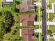 Overhead view shows the roof and the surrounding landscape, showcasing the property's prime location in neighborhood at 921 Costa Mesa Ln, Kissimmee, FL 34744