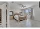 Bright bedroom with large bed and ensuite bathroom at 921 Costa Mesa Ln, Kissimmee, FL 34744