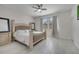 Bedroom with large bed and windows at 921 Costa Mesa Ln, Kissimmee, FL 34744