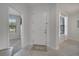 Inviting foyer featuring neutral tile flooring and a view into adjacent rooms at 921 Costa Mesa Ln, Kissimmee, FL 34744