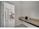 Hallway with built in desk and view to the bedroom at 921 Costa Mesa Ln, Kissimmee, FL 34744